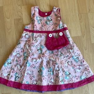 Reversible dress. Little girls size.  Handmade. Unicorns one side/purple other.